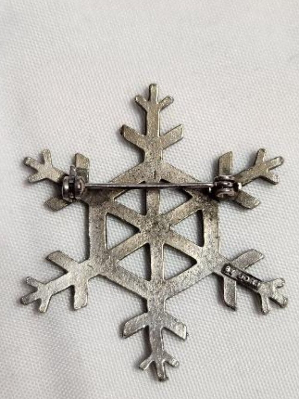Vintage Silver Toned Snowflake Brooch "By Jorj" View 2